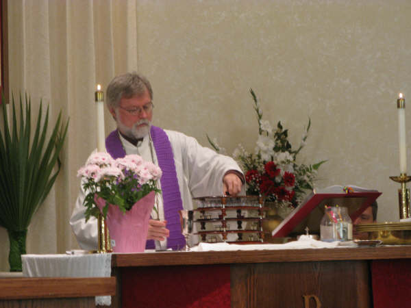 Pastor Laurin Vance preparing Communion