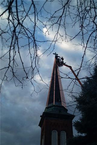 Copper on steeple replaced after hailstorm